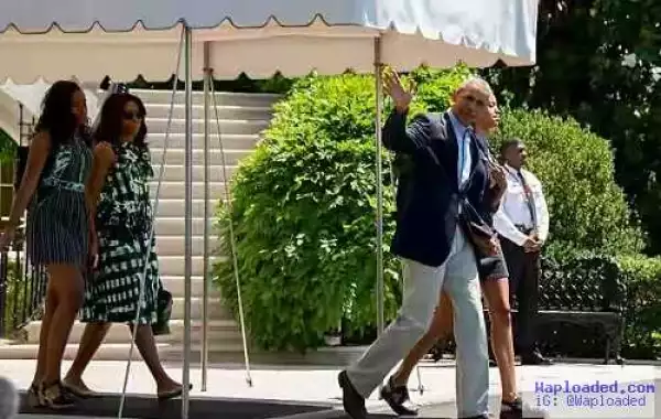 Photos: The Obamas Jet Off For Family Vacation